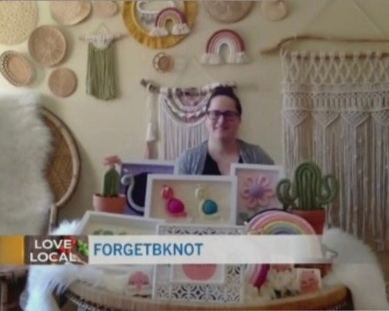 Brenda from ForgetBKnot with a cactus and snail decoration